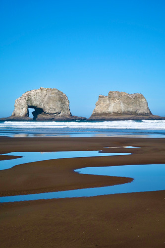 Twin Rocks formation during minus tide. A great view from Twin Rocks Turnaround Park. Twin Rocks formation during minus tide. A great view from Twin Rocks Turnaround Park.